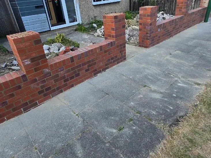 New brick front boundary walls with brick pillars